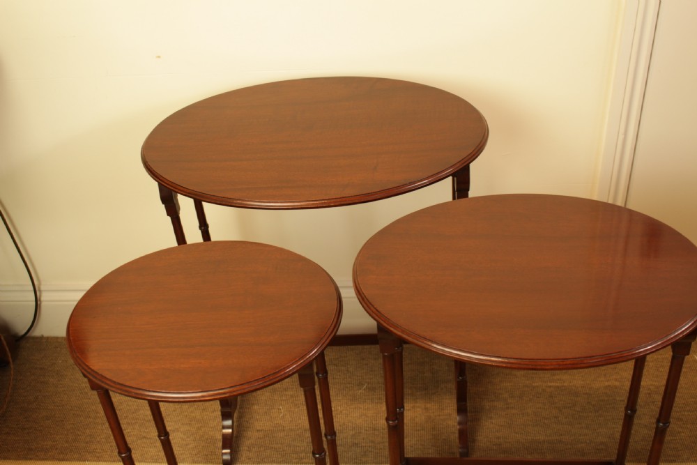 A Set Of Three Mahogany Nest Of Tables View II