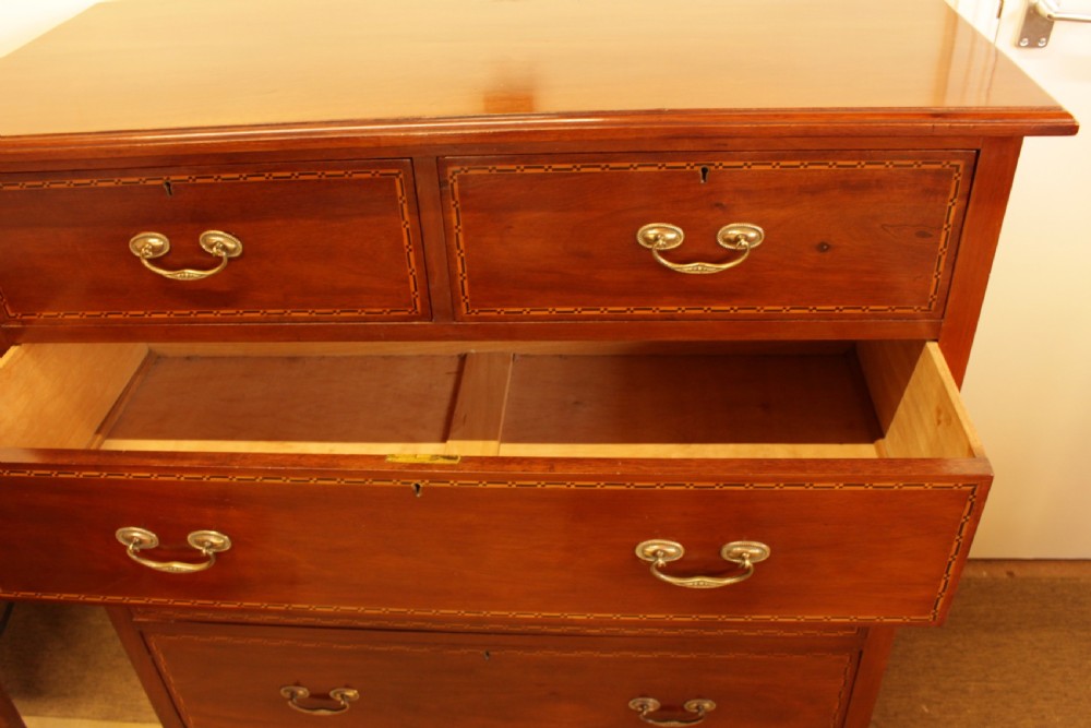 A Walnut Chest Of Drawers  View IV