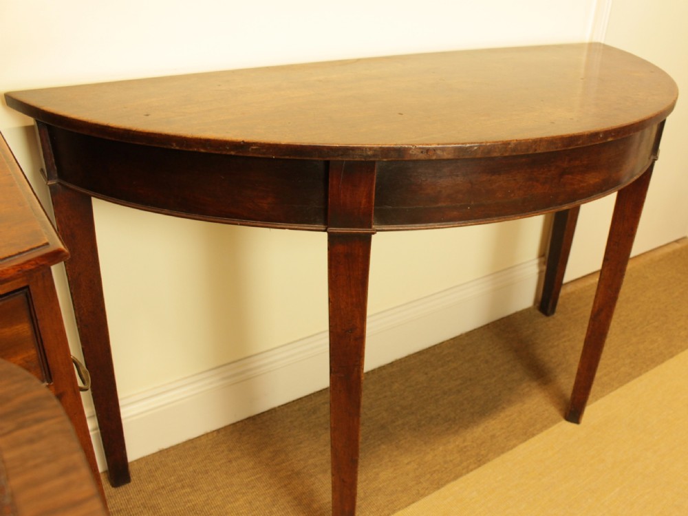 A Georgian Mahogany Demi Lune Table  View IV