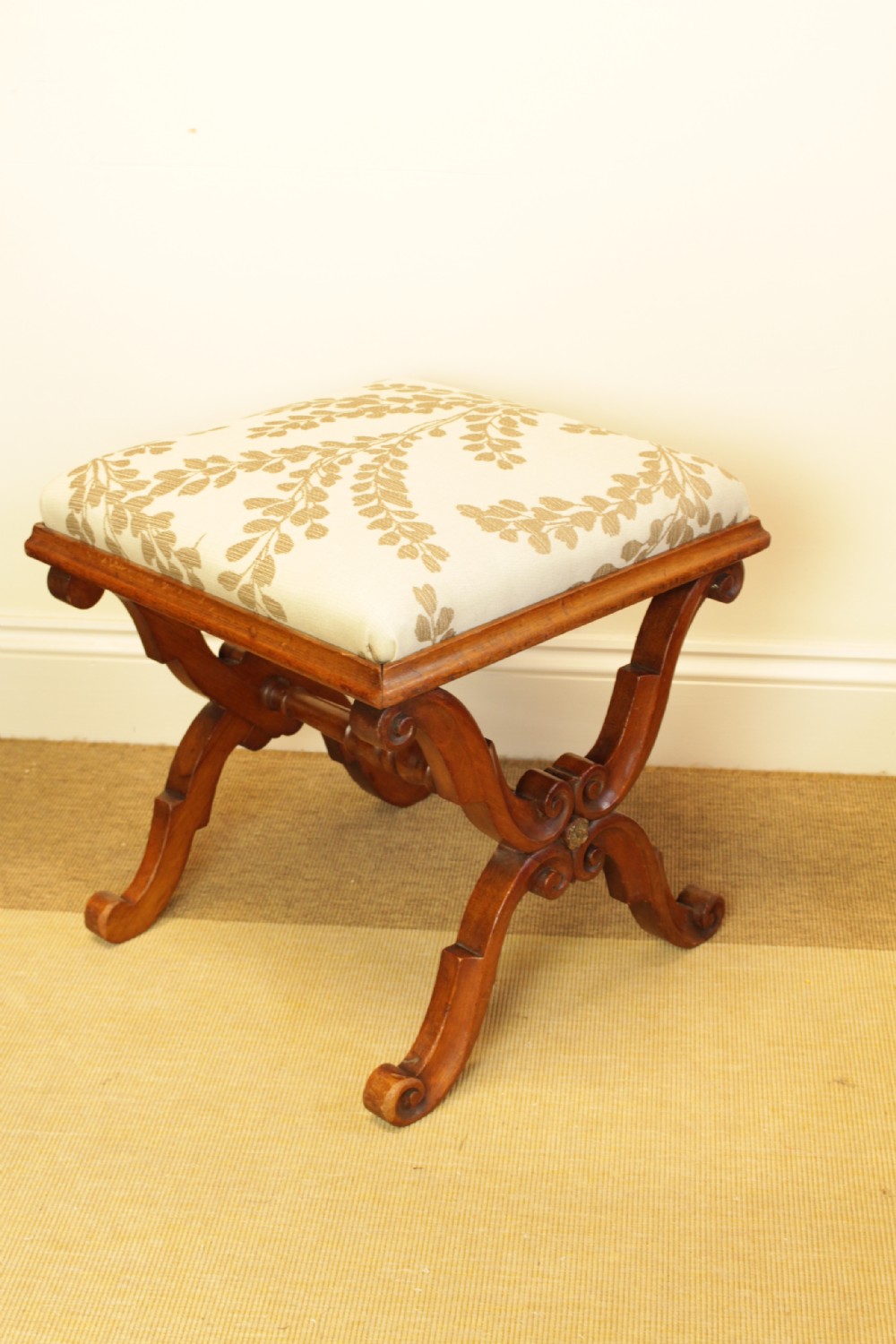 A Walnut X Frame Stool View V