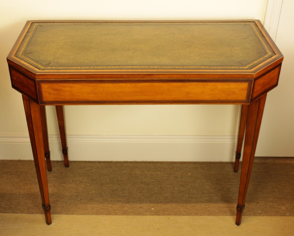 A Regency Satinwood and Rosewood Games Table 