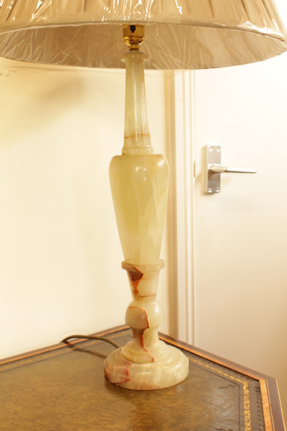 A Pair Of 1930's Italian Onyx Table Lamps 


A Pair Of 1930's Onyx Table Lamps   View II