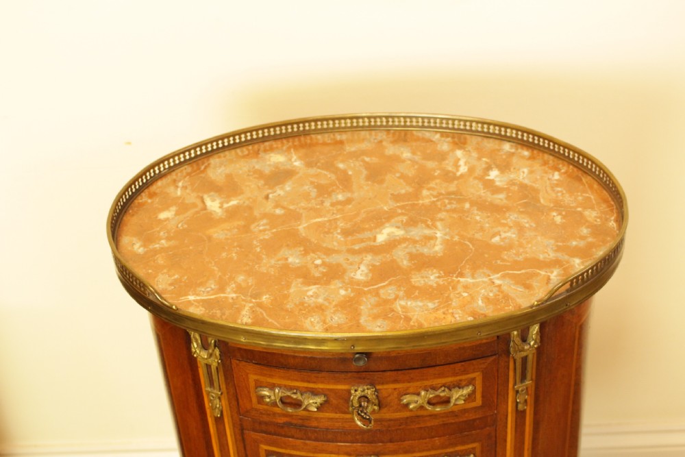A French Walnut Oval Marble Top Three Drawer Side Table   View IV