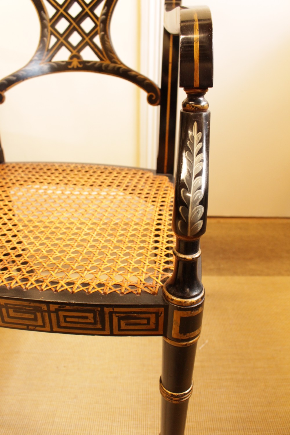 A Pair Of Regency Style Ebonised Open Arm Chairs  View IX