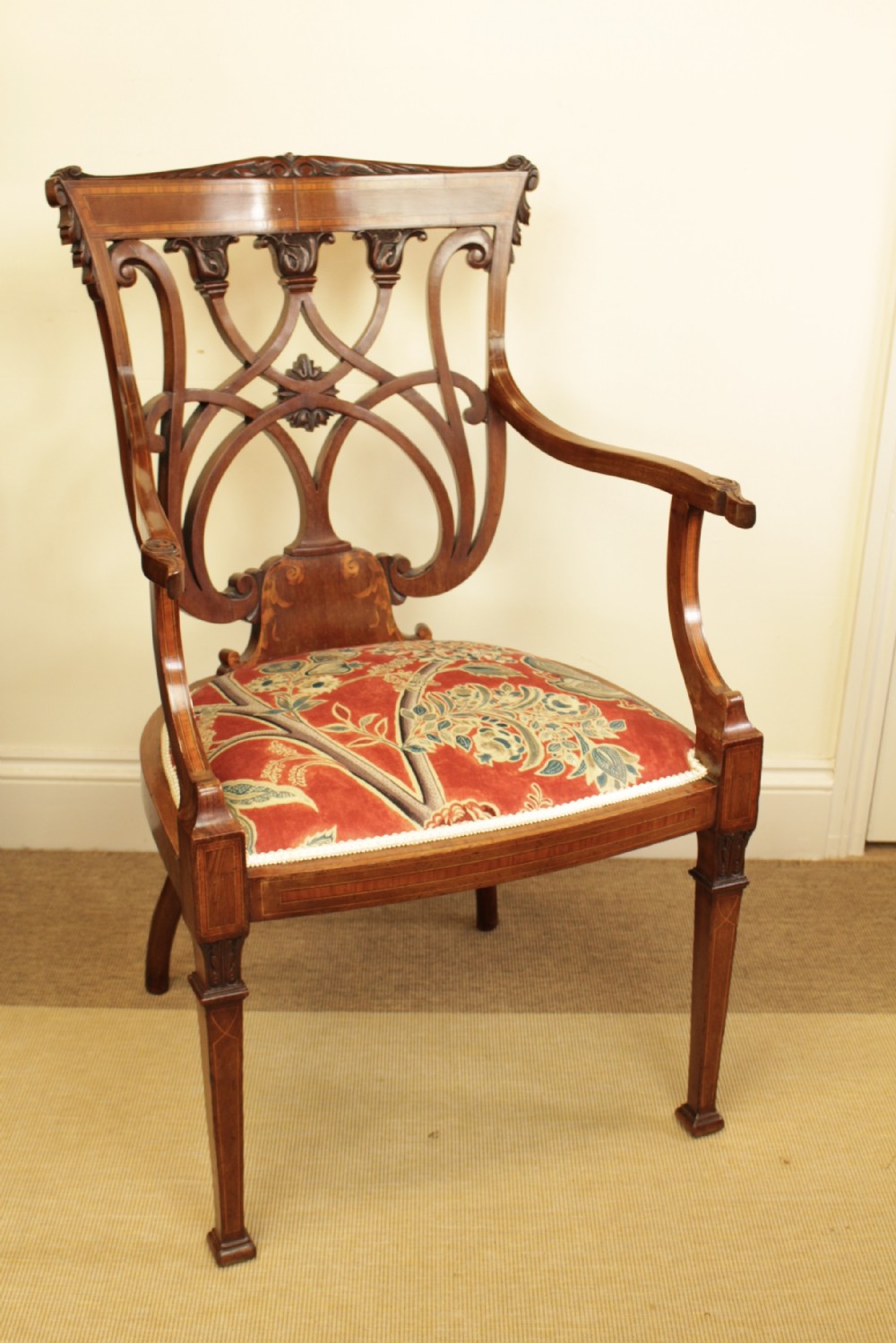 A Edwardain Mahogany Carved & Inlaid Open Arm Chair