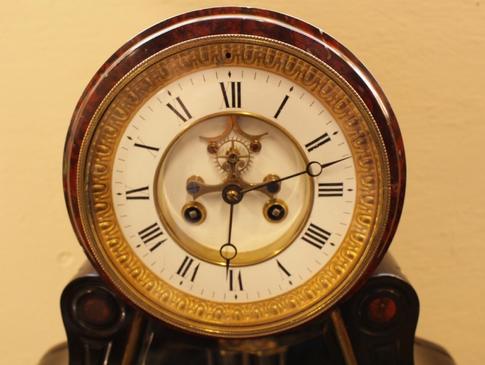 A French Marble & Polished Slate Mantal Clock  View IV