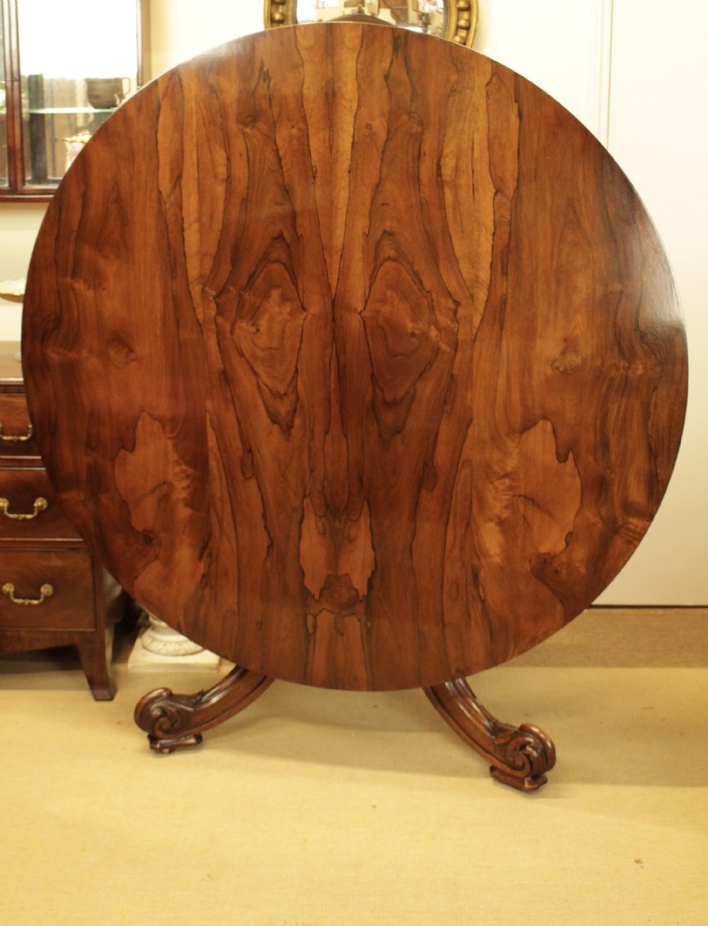 A Quality Rosewood Tilt Top Centre/Dining Table (width 135 cms)