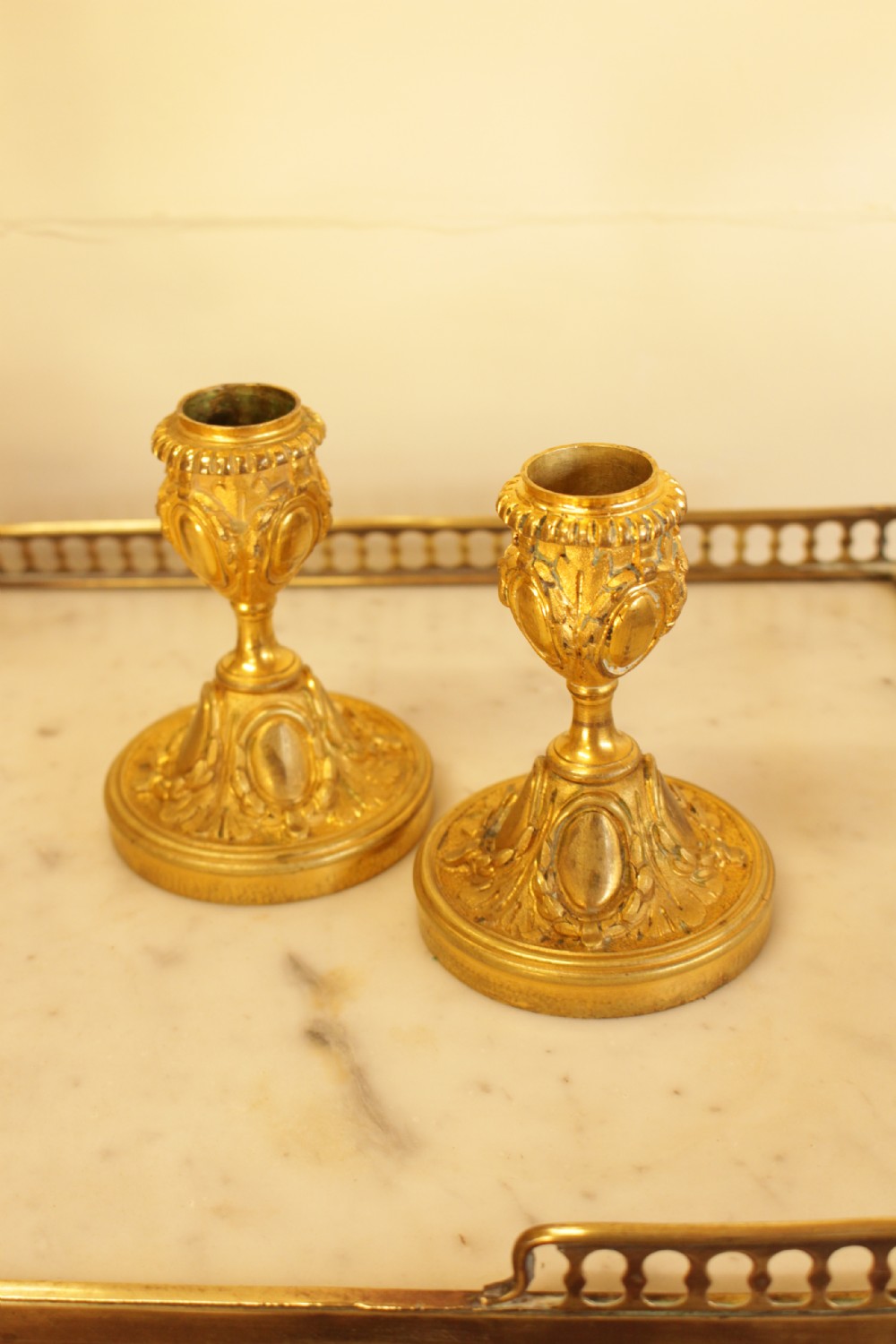 A Pair Of 19th Century French Gilt Metal Candle Sticks  View II