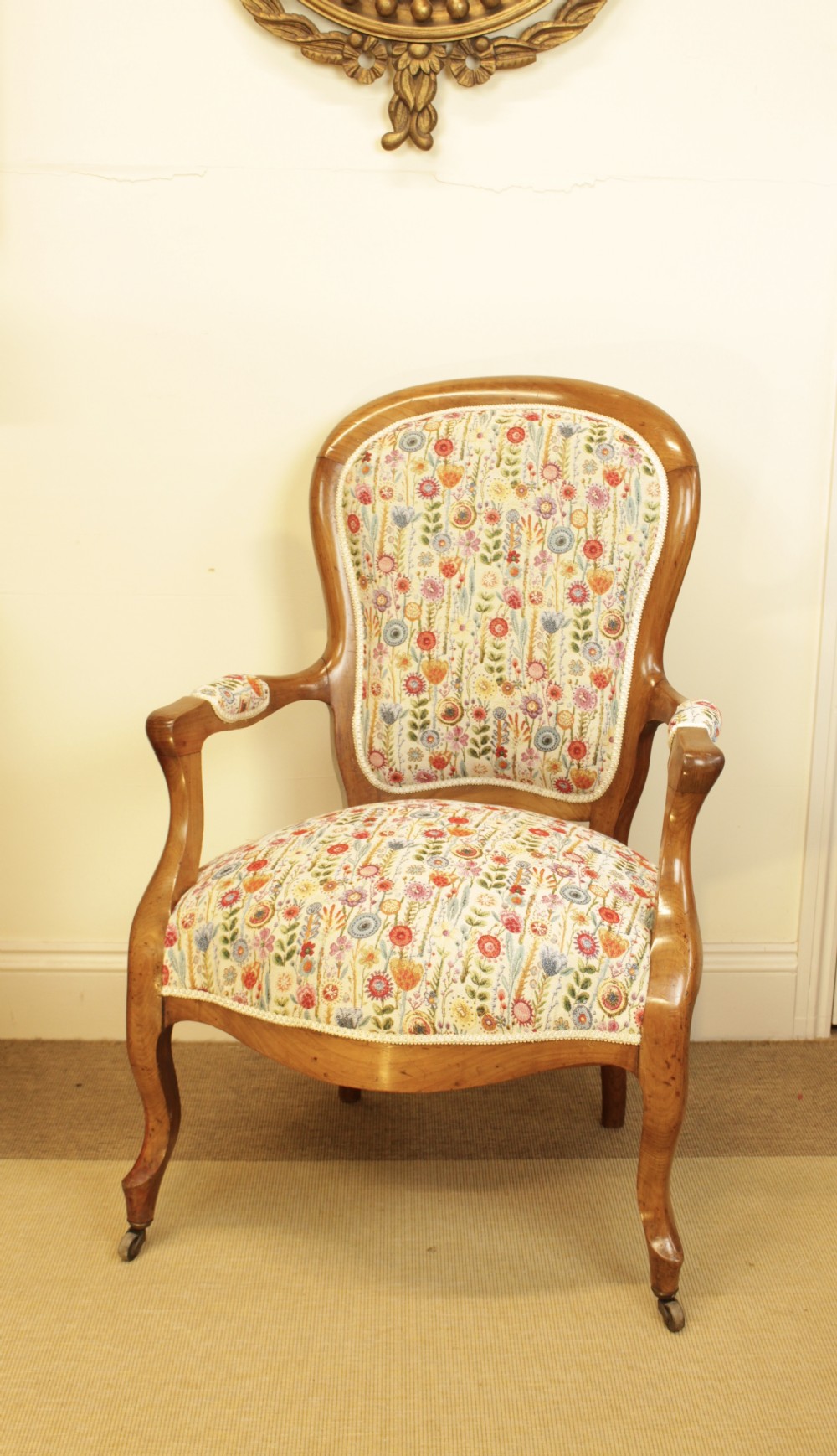 A French Walnut Spoon Back Open Armchair