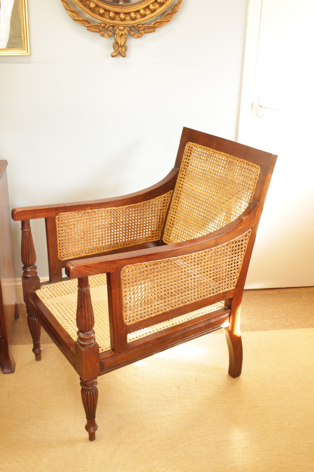 An Anglo-Indian Hardwood Frame Bergere Chair  View II