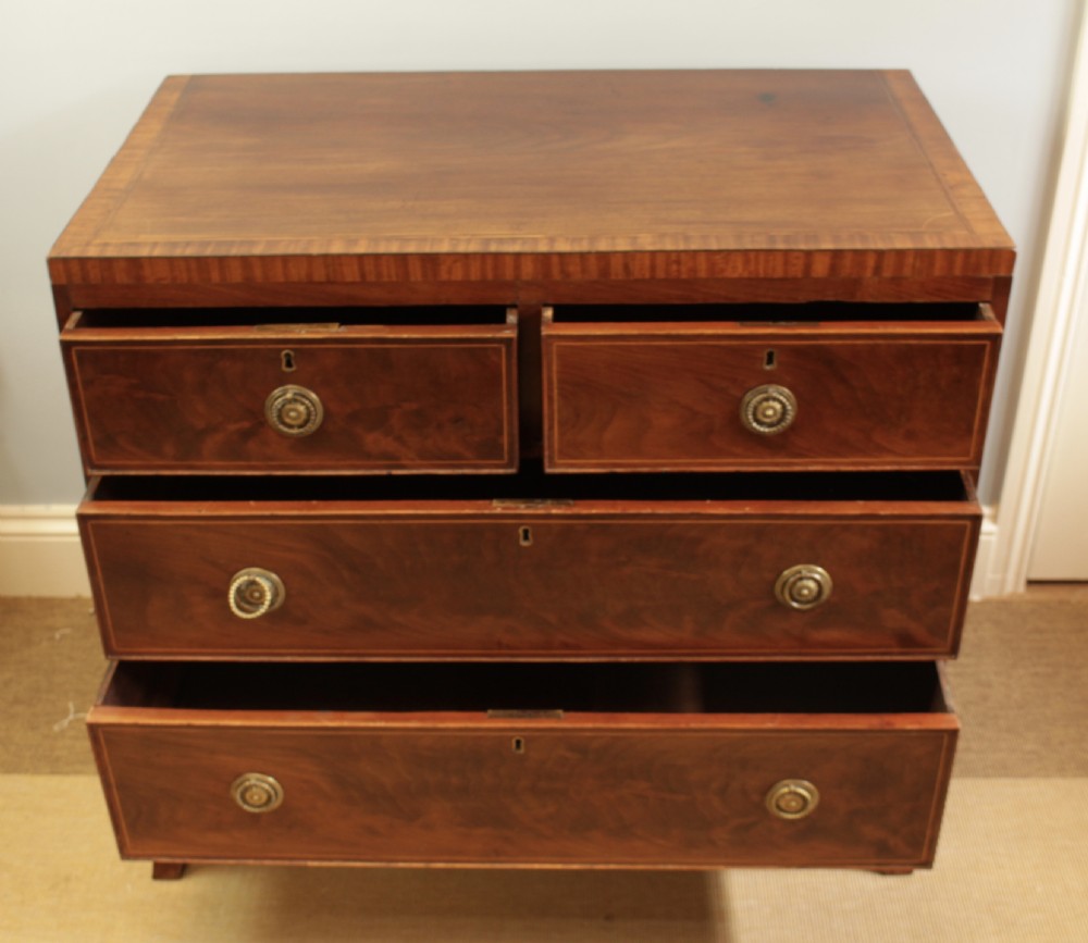 An Regency Flamed Mahogany Chest Of Drawers View III