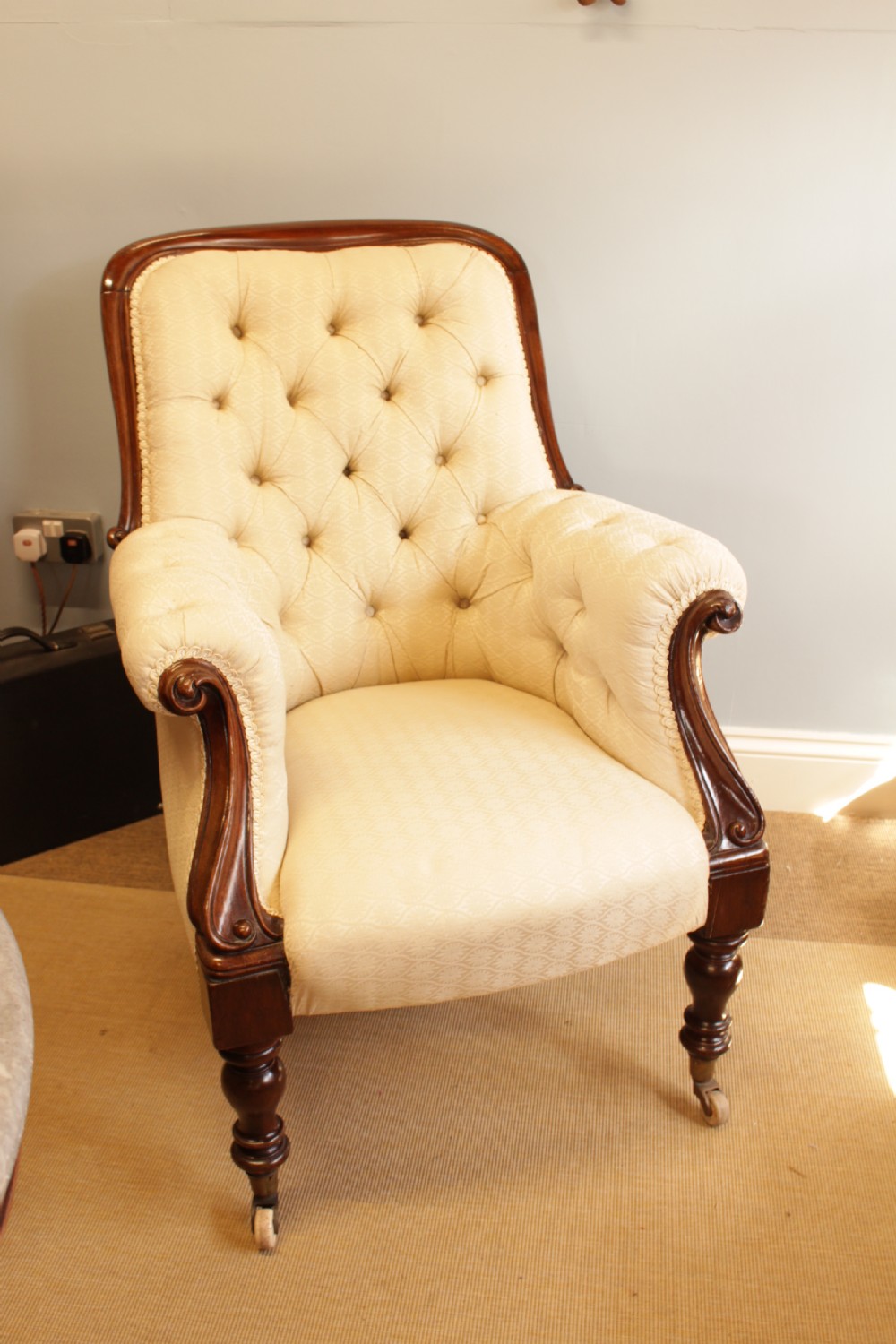 A 19th C. Mahogany Button Back Armchair 
