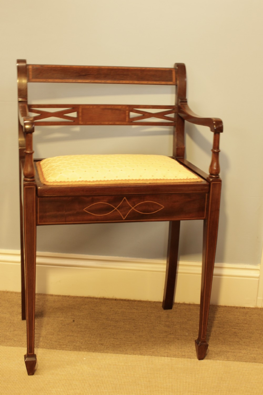 An Edwardian Mahogany Music Chair 