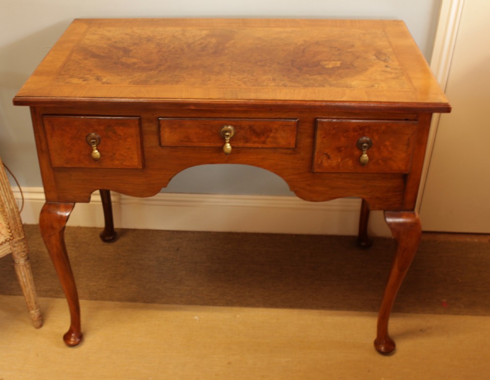 A George III Walnut Lowboy
