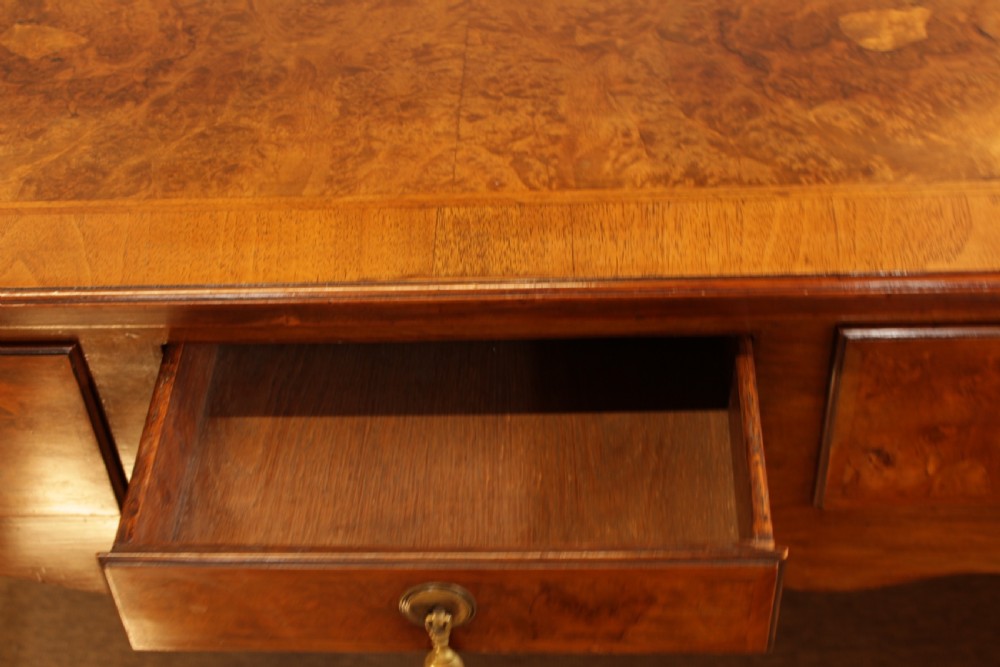 A George III Walnut Lowboy View III