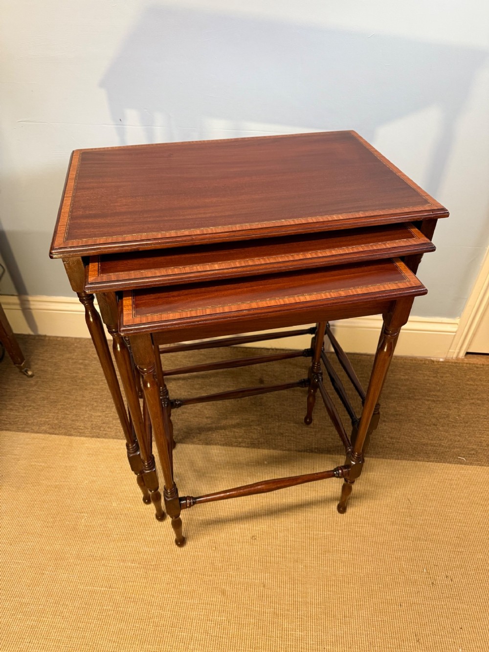 An Edwardian Mahogany Set Of Three Tables