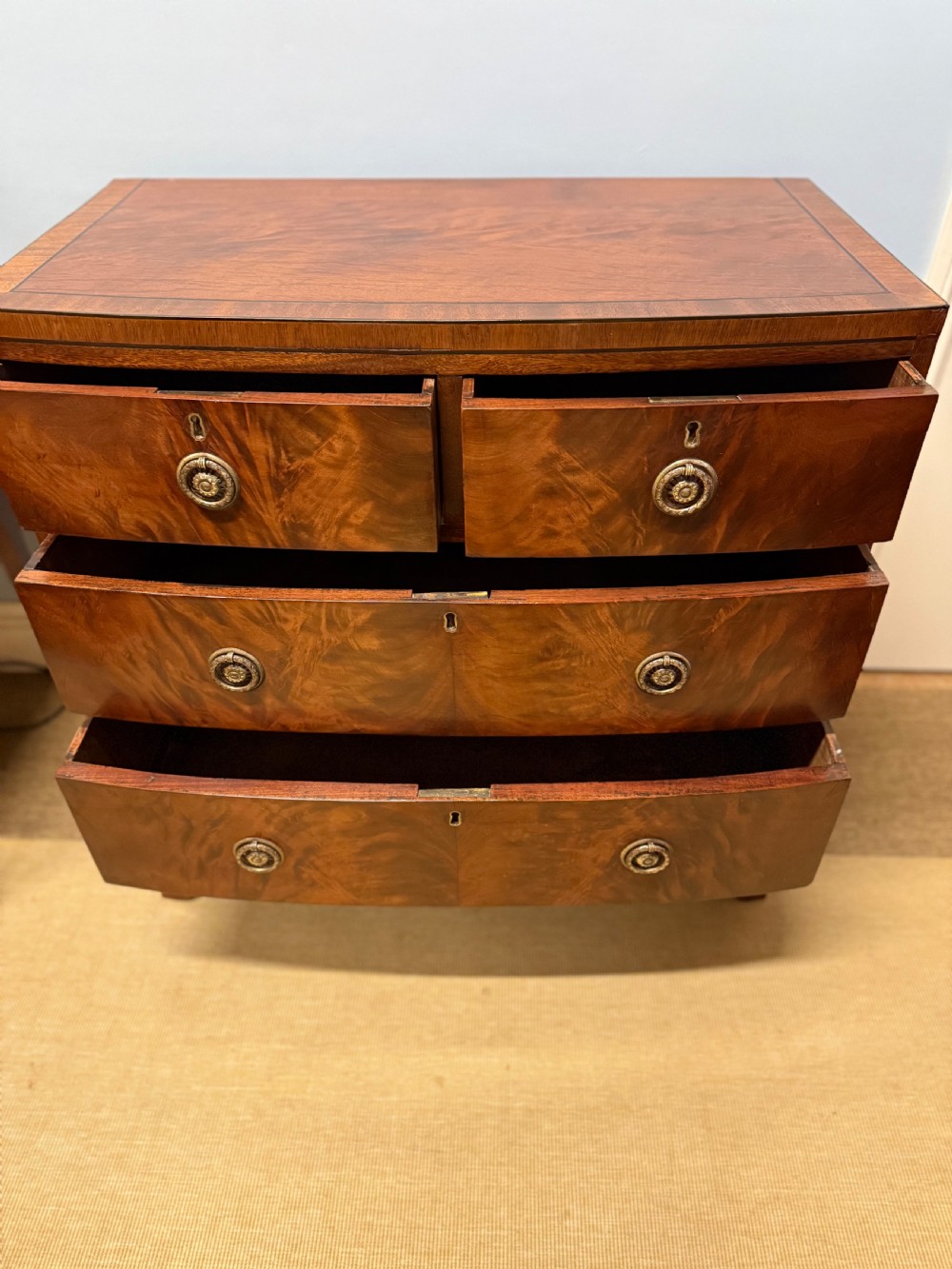 An Early 19th Century Flamed Mahogany Chest Of Drawers View IV
