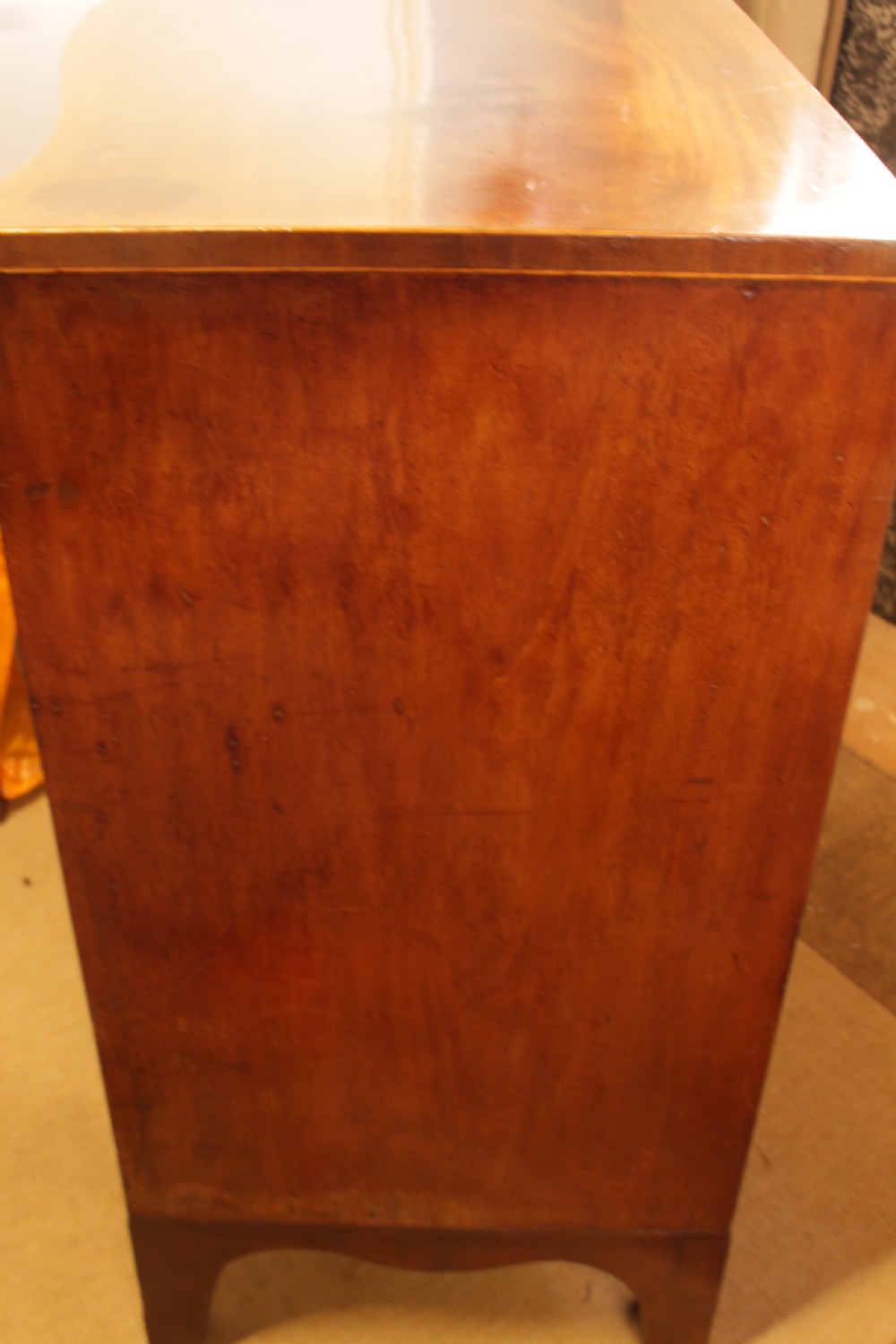 A Georgian Mahogany Serpentine Chest Of Drawers   View X