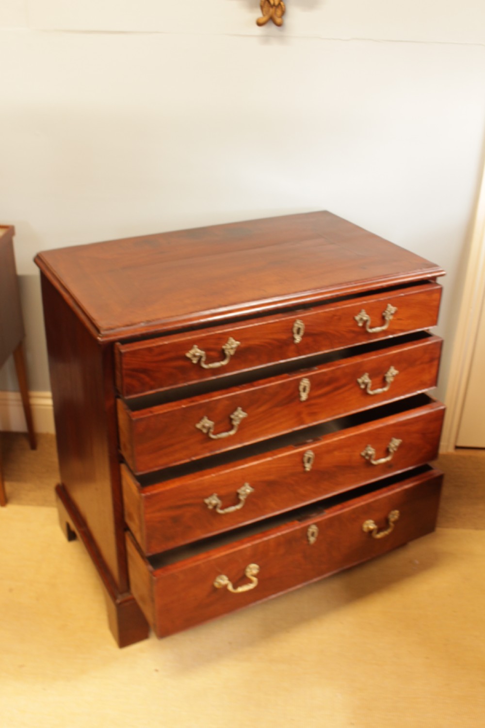 A Georgian Mahogany Chest Of Drawers  View II
