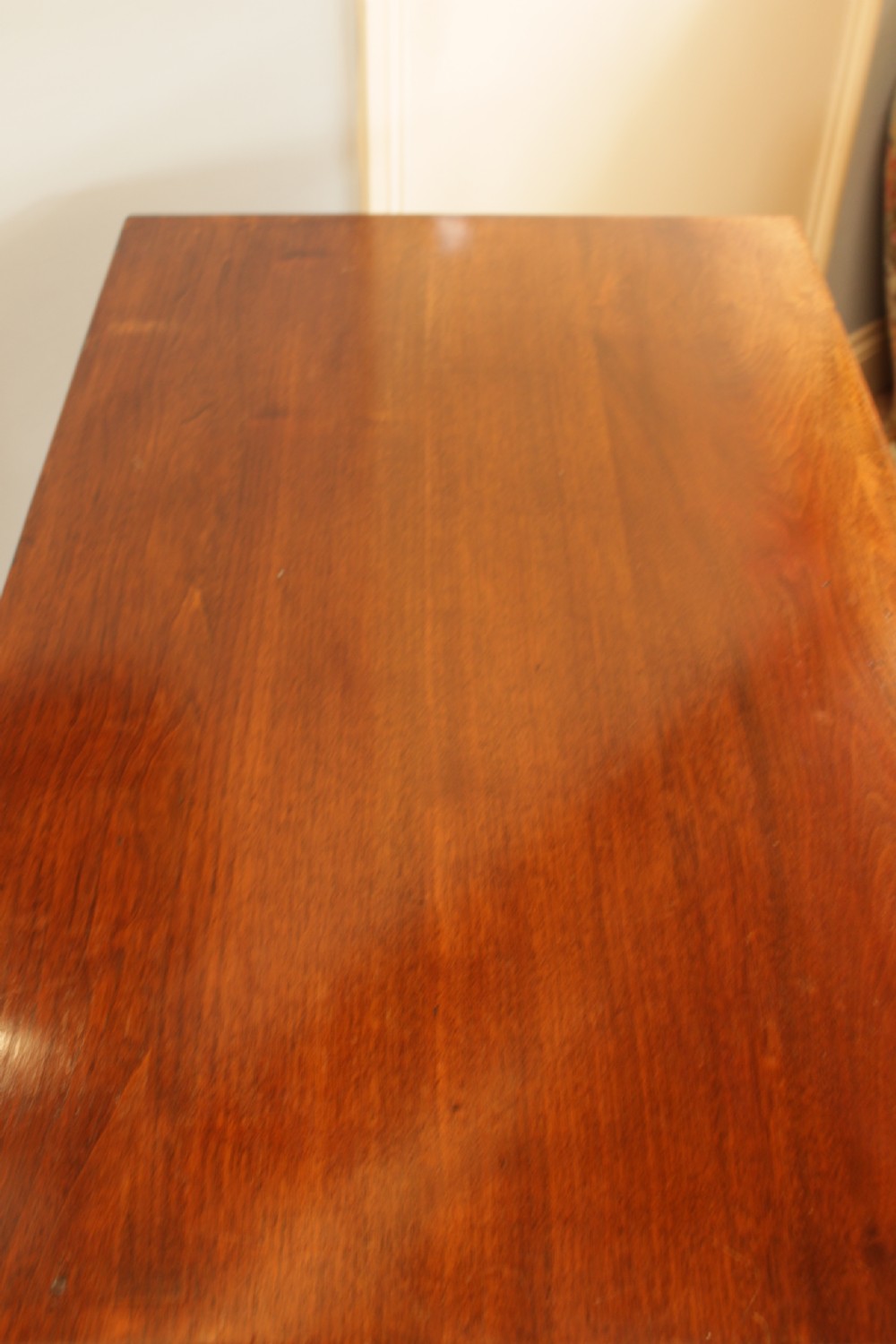 A Edwardian Walnut Chest Of Drawers  View II