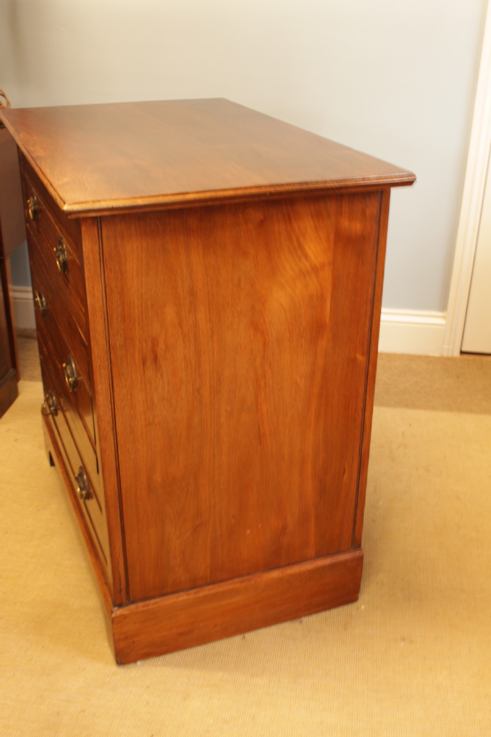 A Edwardian Walnut Chest Of Drawers  View III
