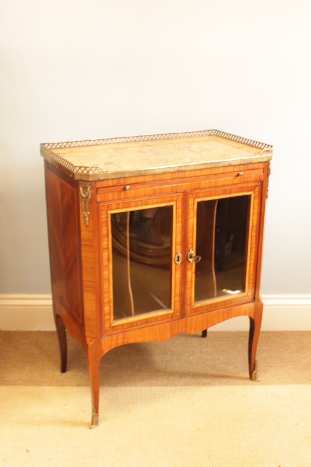 A French Walnut Marble Top Cabinet