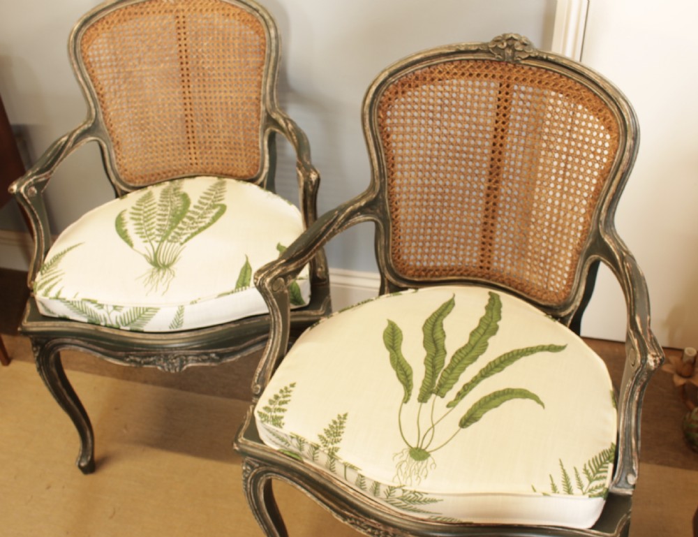 A Pair Of 1920's French Caned Chairs  View II