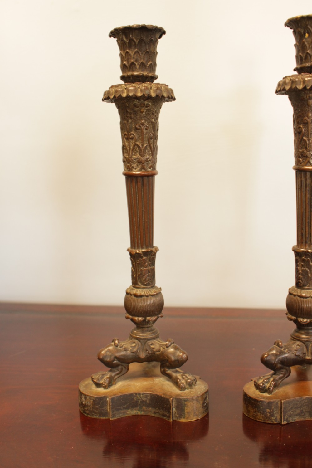 A Pair Of Bronze Candlesticks  View II