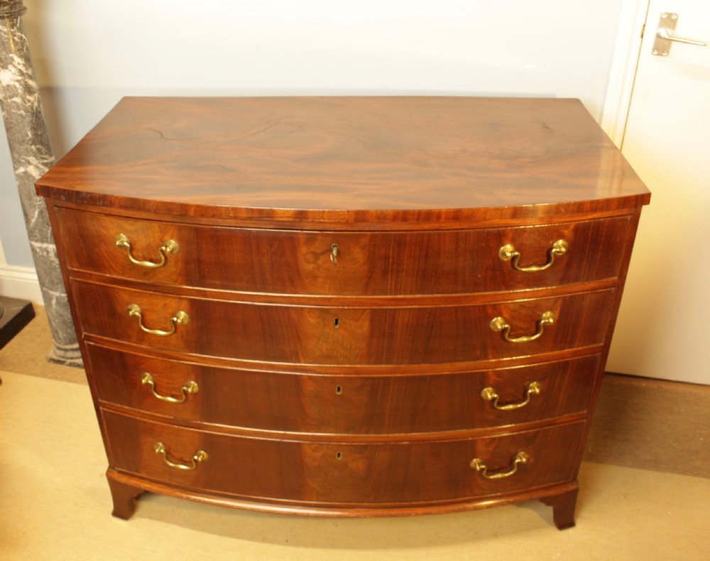 A Georgian Mahogany Bow-Front Chest of Drawers 