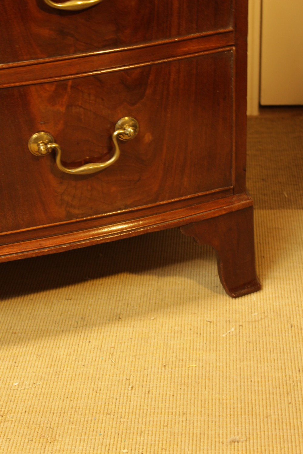 A Georgian Mahogany Bow-Front Chest of Drawers  View III