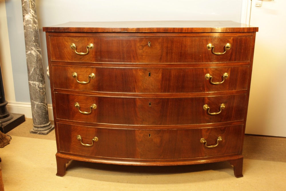A Georgian Mahogany Bow-Front Chest of Drawers  View V