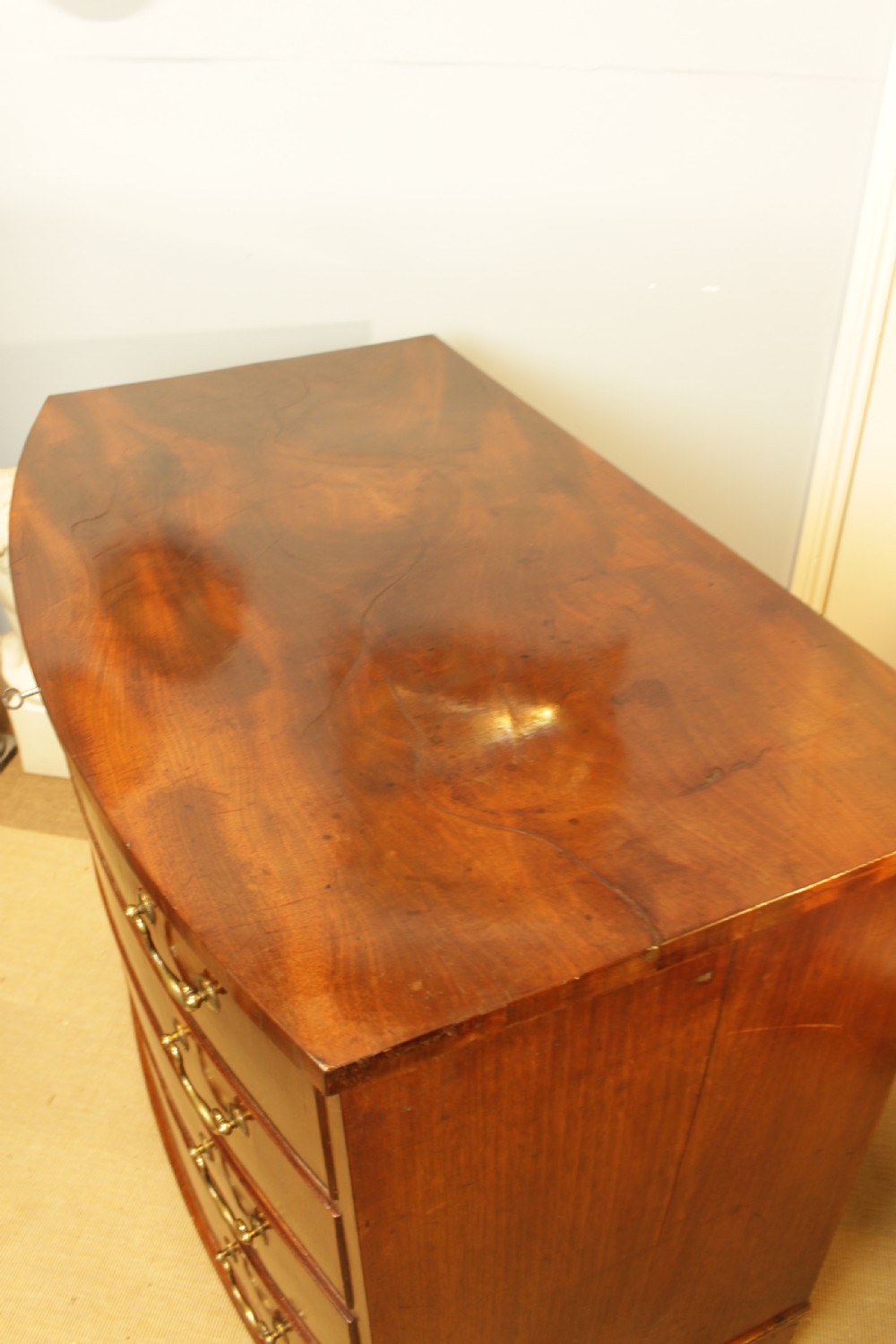 A Georgian Mahogany Bow-Front Chest of Drawers  View VIII