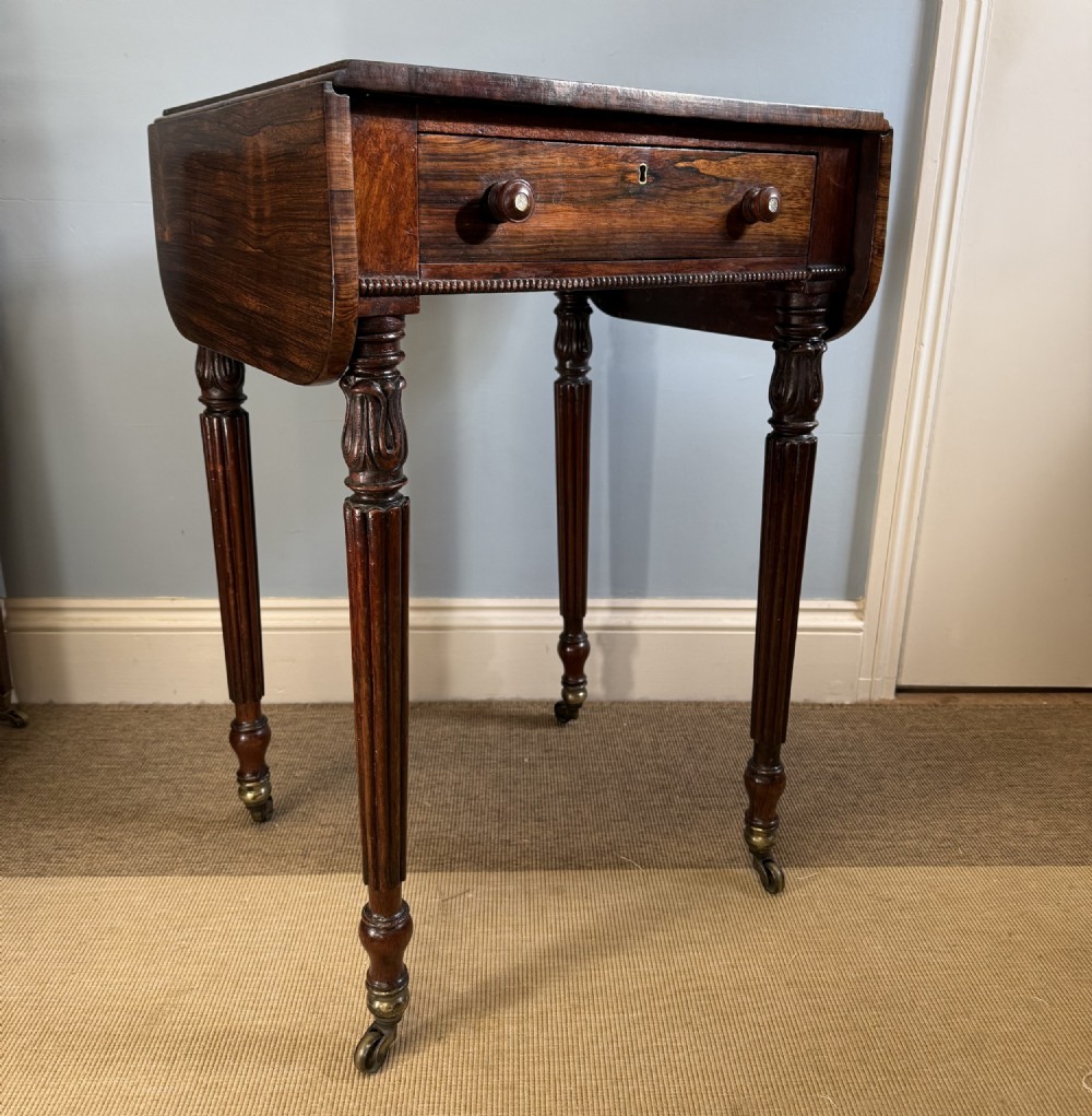 A Regency Rosewood Drop Leaf Table  