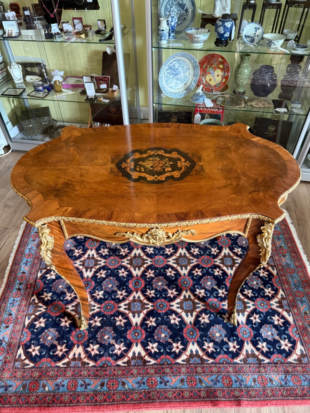 An Elegant French Walnut and Gilt Centre or Writing Table