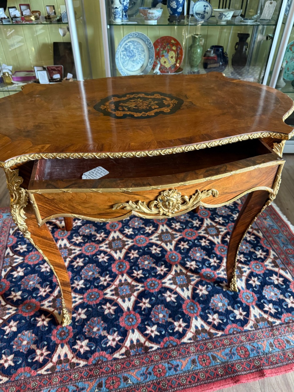 An Elegant French Walnut and Gilt Centre or Writing Table View IV
