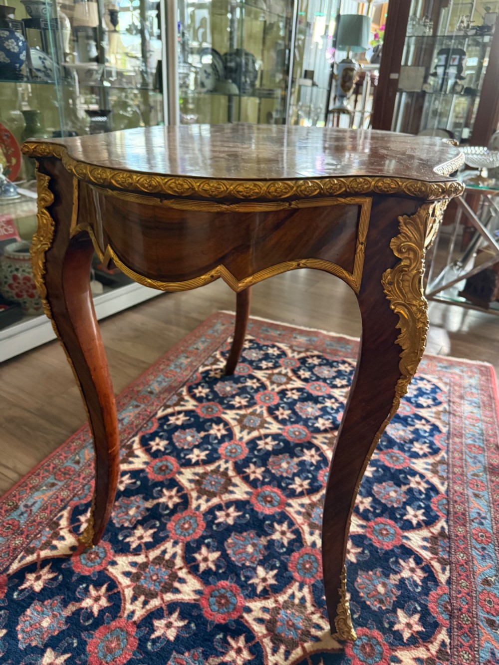 An Elegant French Walnut and Gilt Centre or Writing Table View V