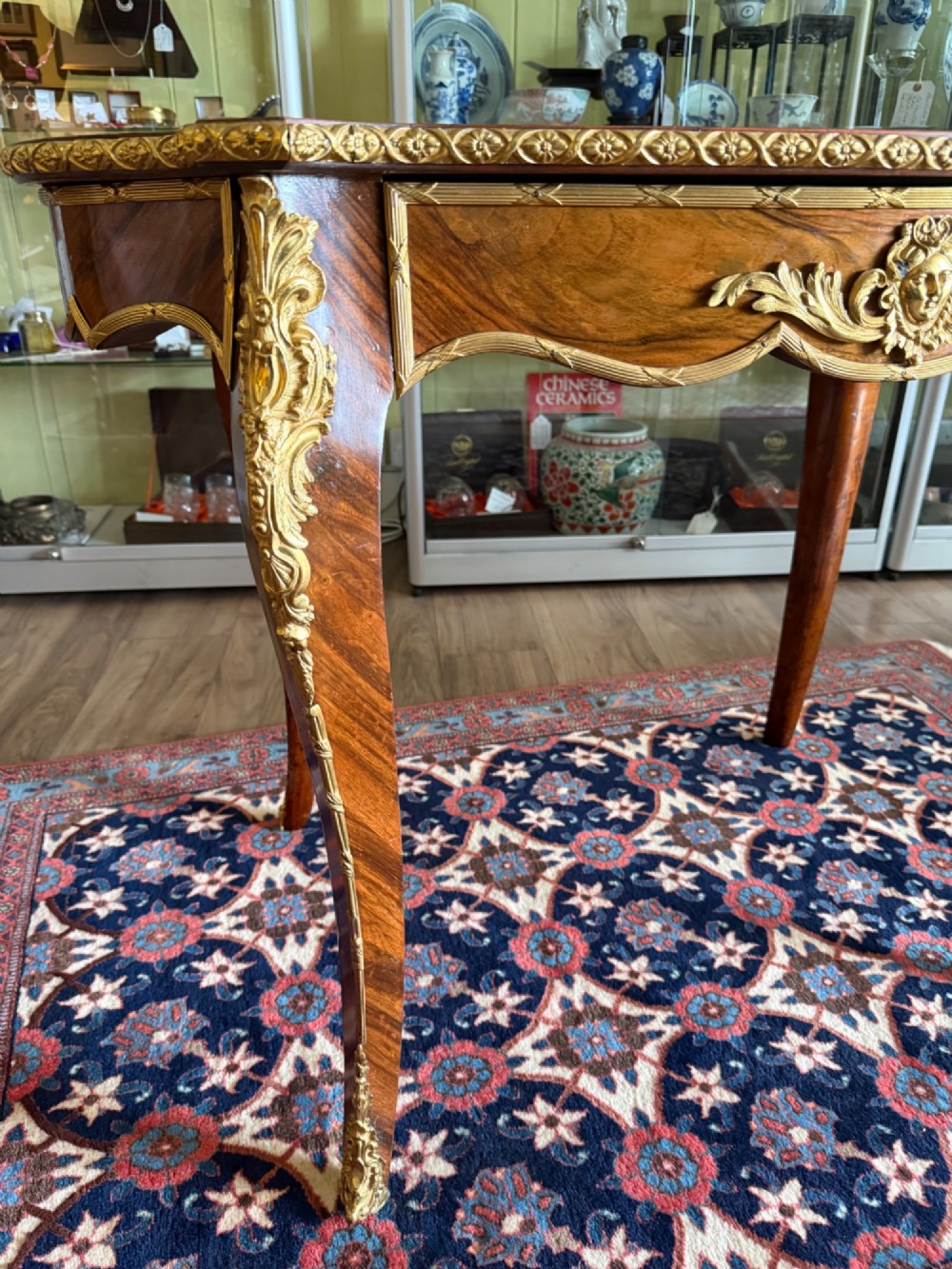 An Elegant French Walnut and Gilt Centre or Writing Table View VII