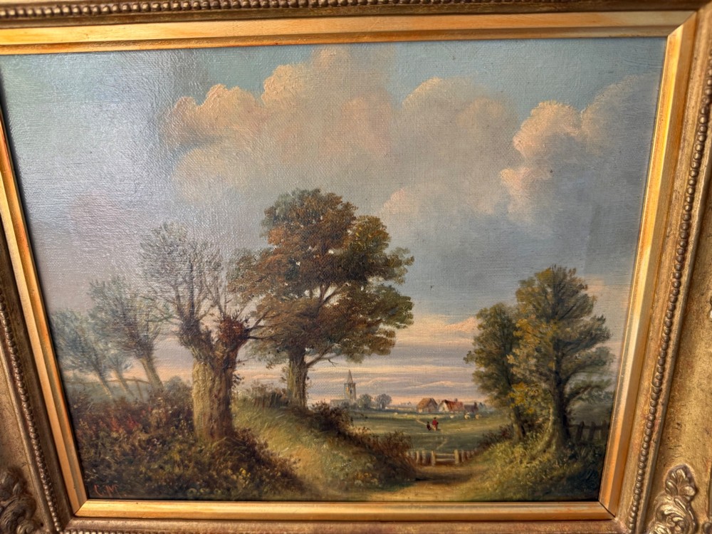 An antique Victorian oil painting on canvas depicting a rural English countryside scene set within an ornate gilded frame. View II