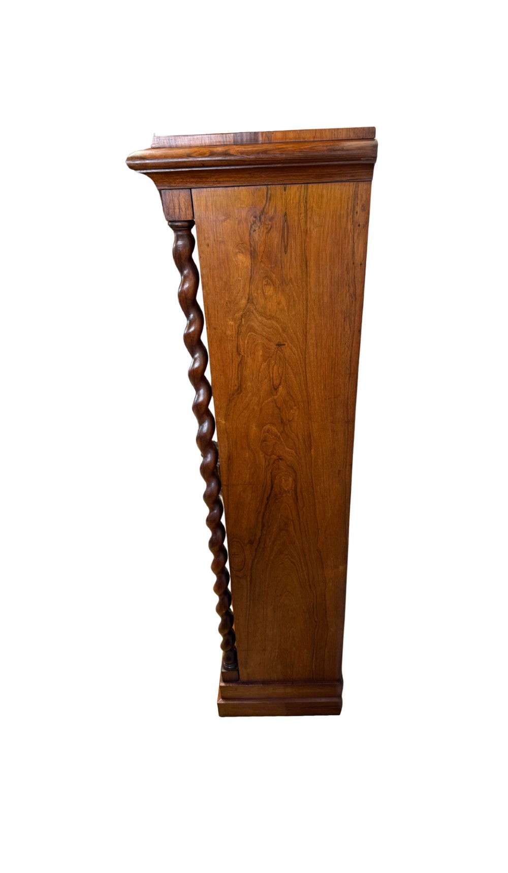 A 19th-century Victorian rosewood open bookcase featuring four open shelves flanked by barley twist pilasters and topped with carved scrollwork. View IV