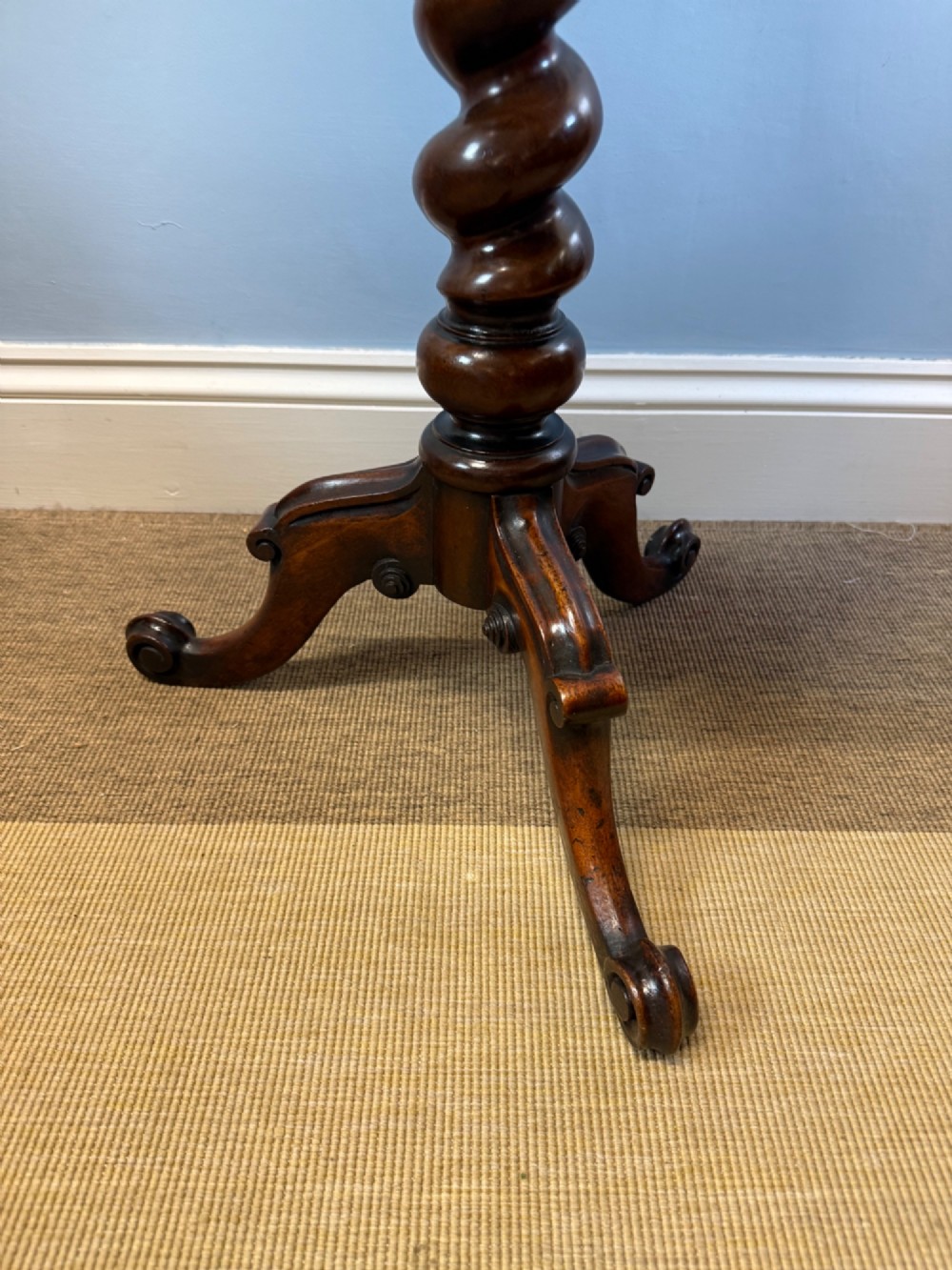 A 19th-century mahogany tripod side table featuring a scalloped piecrust edge top, a spiral barley twist column stem, and carved cabriole legs. View II