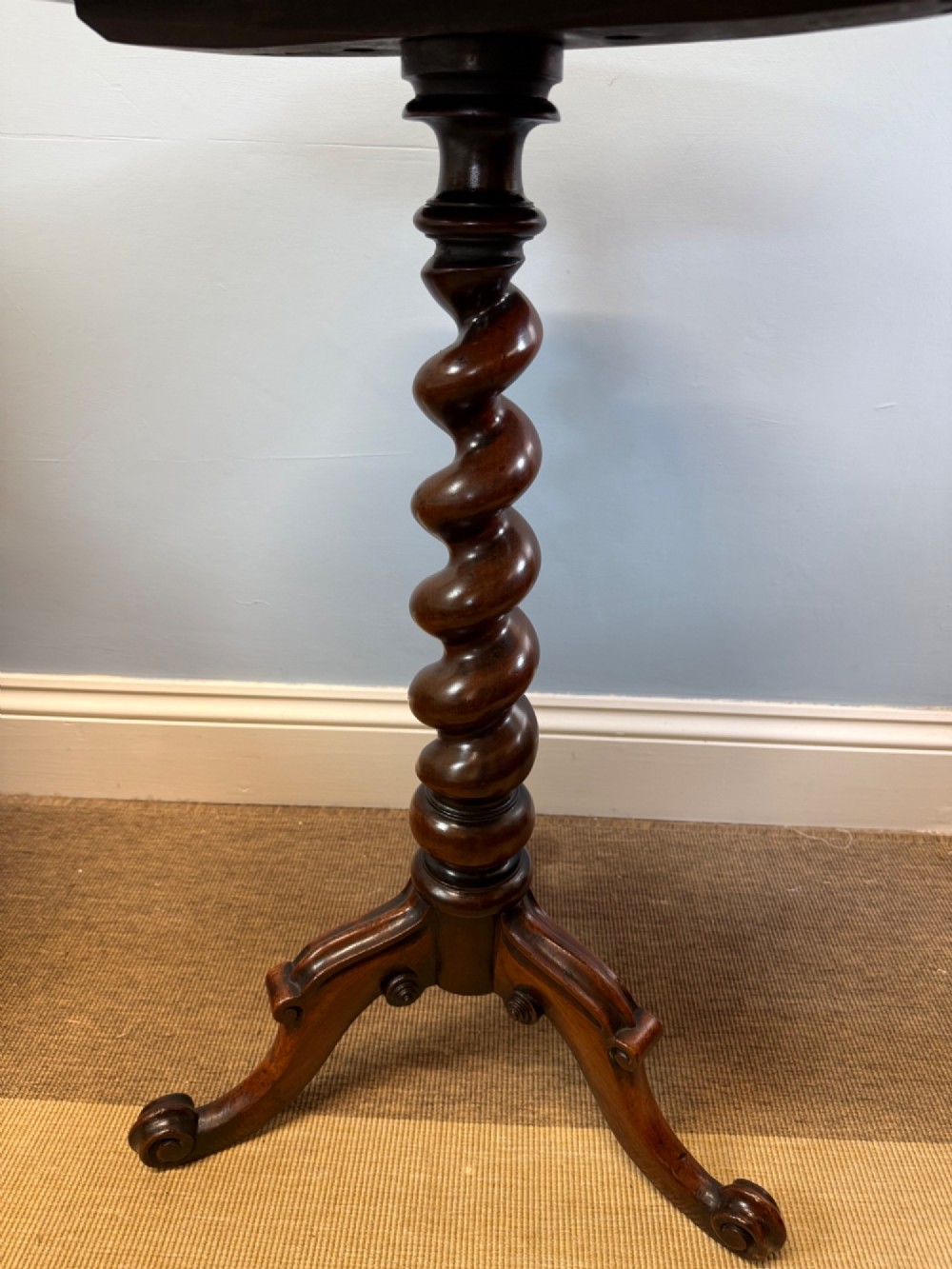 A 19th-century mahogany tripod side table featuring a scalloped piecrust edge top, a spiral barley twist column stem, and carved cabriole legs. View IV