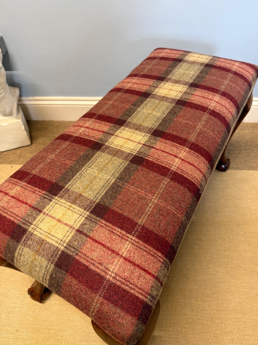 A rectangular mahogany stool featuring tartan wool upholstery, stud trim, cabriole legs, and ball and claw feet. View III