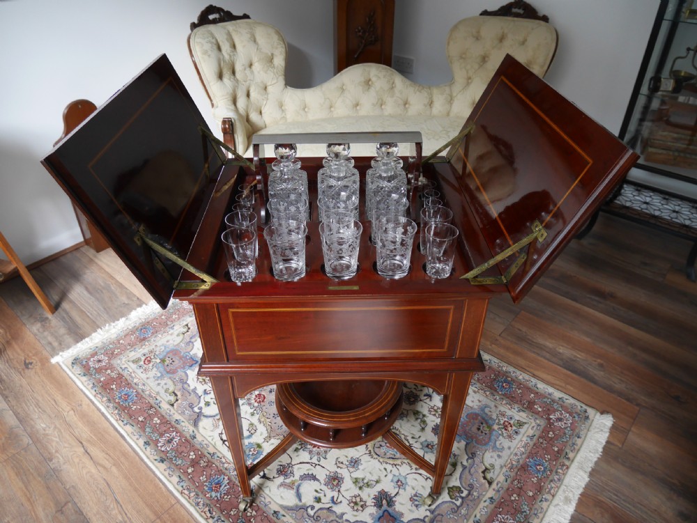 An Edwardian Mahogany and Satinwood Inlaid 'Surprise' Drinks Cabinet