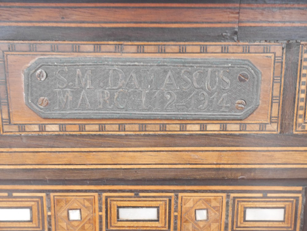 An antique rectangular Syrian games table featuring geometric micro-mosaic wood and mother-of-pearl inlays, turned drawers, and an intricate lower stretcher frame. View XI