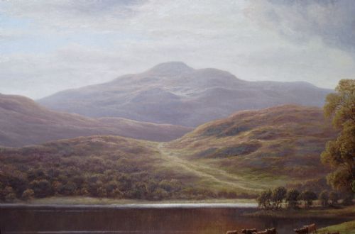 fig 4. A Victorian landscape oil painting depicting cattle near a reflective lake with surrounding mountains, presented in a gold leaf frame.