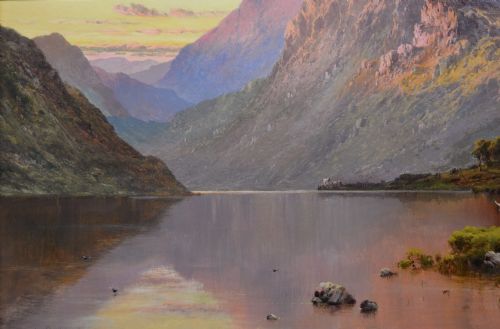 fig 4. An oil painting of a Scottish loch and mountains at sunset with Highland cattle, framed in an ornate gilded frame.