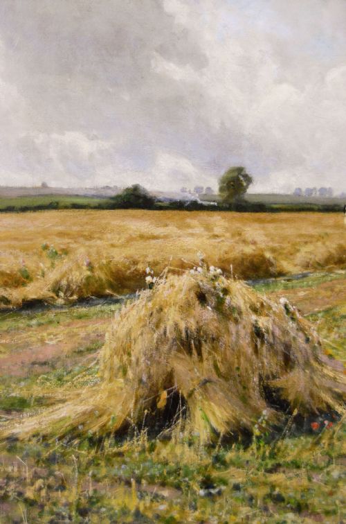 fig 4. A rural landscape oil painting depicting a wheat harvest with haystacks and horses framed in an ornate gilded frame.