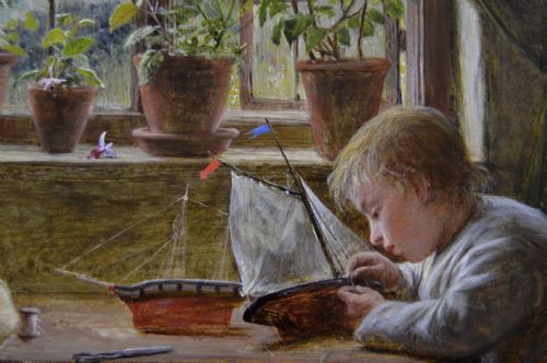 fig 5. A framed 19th-century oil painting depicting a mother seated at a wooden table watching her young son play with a toy boat inside a sunlit cottage interior.
