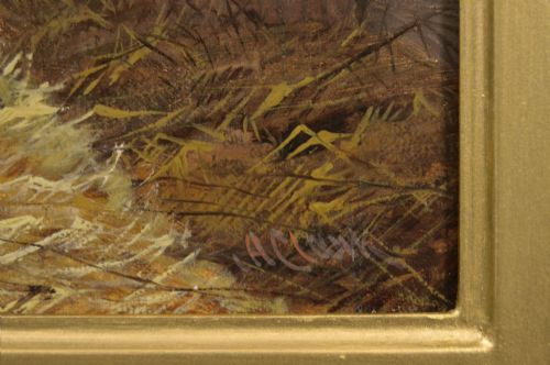 fig 4. An oil painting of a brown bay racehorse standing in a straw-filled stable stall set within an ornate gold gilt frame.