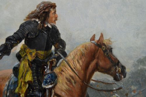 fig 3. An oil painting depicting an English Civil War cavalry engagement framed in an ornate gold giltwood frame.